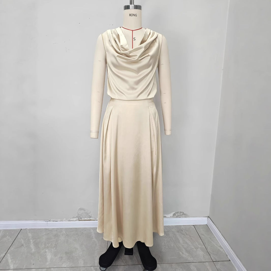 Sleeveless Scooped-neck Top Paired With A Pleated Skirt